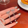 thumbnail image 1 of Pendientes largos de borlas de circonita con aguja de plata 925 para mujer, modernos, ligeros, de lujo, con lazo elegante, 1 of 5