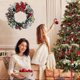 thumbnail image 5 of Christmas Door Wreath, 30cm Christmas Wreaths for Front Door, Christmas Decoration Door Wreath With Bow, Bell, Pine Cone (White+Green), 5 of 5