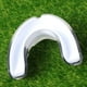 thumbnail image 2 of KAKOWELY 2 protectores bucales para boxeo, baloncesto, taekwondo y lucha. Protegen los dientes superiores e inferiores (color aleatorio)., 2 of 4