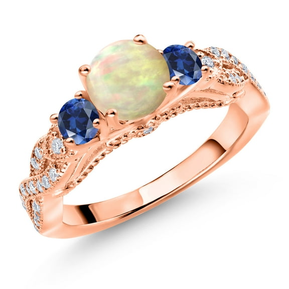 Gem Stone King 18K Rose Gold Plated Silver White Ethiopian Opal Blue Created Sapphire and White Moissanite Engagement Ring for Women (1.11 Cttw, Gemstone, Round Cabochon 6MM and 3MM, Size 9)