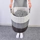 thumbnail image 4 of Cesta de plástico tejida para la ropa: almacenamiento estilo ratán para juguetes, ropa sucia y artículos del hogar, 4 of 5