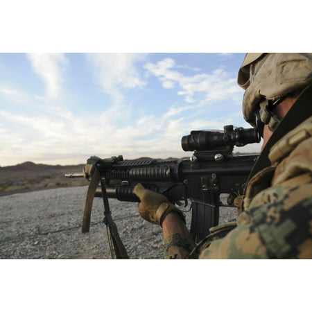 Us Army Infantry Tactics October 18 2009 - A police sergeant sights in to fire on a target during infantry tactics training at Graze Range at the US Army Yuma Proving Ground in Arizona Poster Print ()