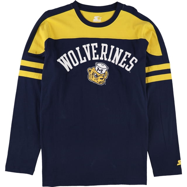 starter camiseta con gráfico de michigan wolverines para hombre, azul, grande camiseta manga larga azul marino con panel superior y hombros amarillo, cuello redondo acanalado; frente con texto curvo "WOLVERINES" en blanco y mascota estampada en el centro; franjas dobles amarillas en las mangas y logo Starter en el puño; adecuada para uso atlético o casual diaria.