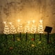thumbnail image 3 of Árbol de Navidad solar para decoración navideña al aire libre, luces LED navideñas con 8 modos de estrella, impermeables, para patio, jardín, césped, decoración navideña (negro), 3 of 9