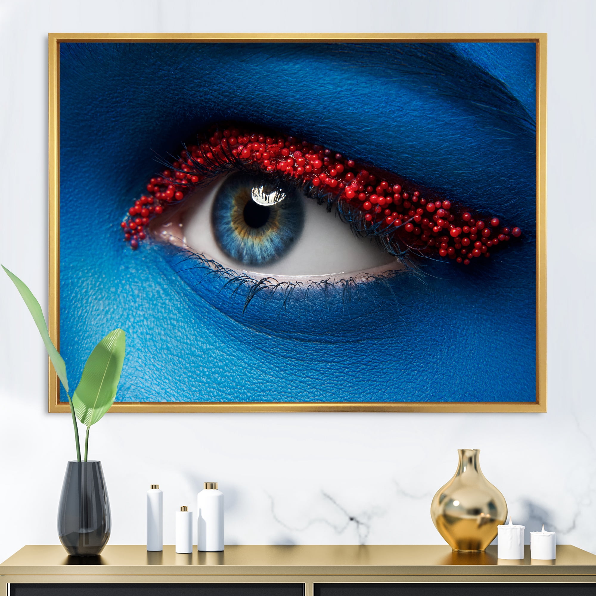 Designart 'Woman Eye With Blue Paint On Face & Red Balls' Modern Framed Canvas Wall Art Print