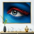 thumbnail image 2 of Designart 'Woman Eye With Blue Paint On Face & Red Balls' Modern Framed Canvas Wall Art Print, 2 of 5