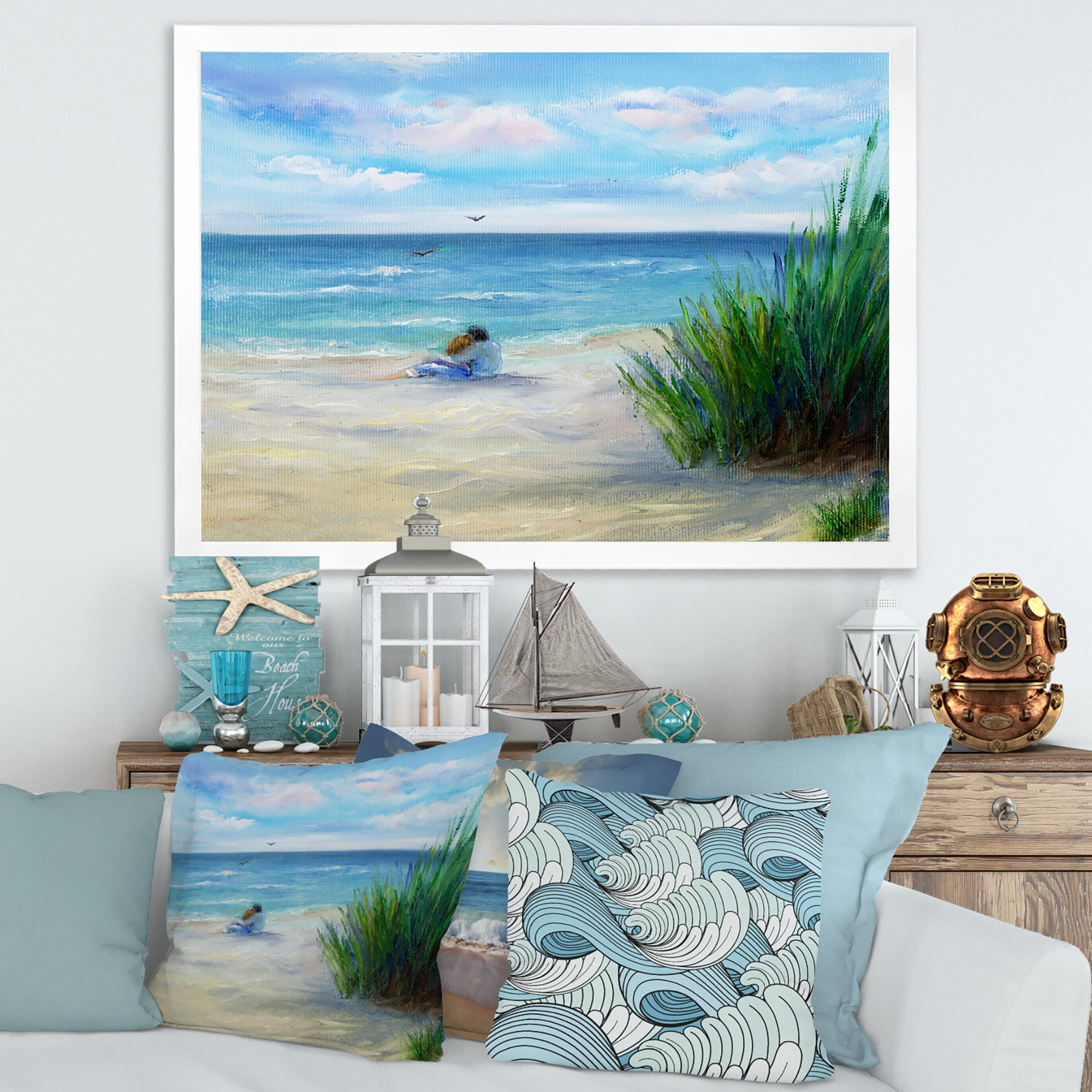 Designart 'Couple Sitting In Love By The Beach' Nautical & Coastal Framed Art Print
