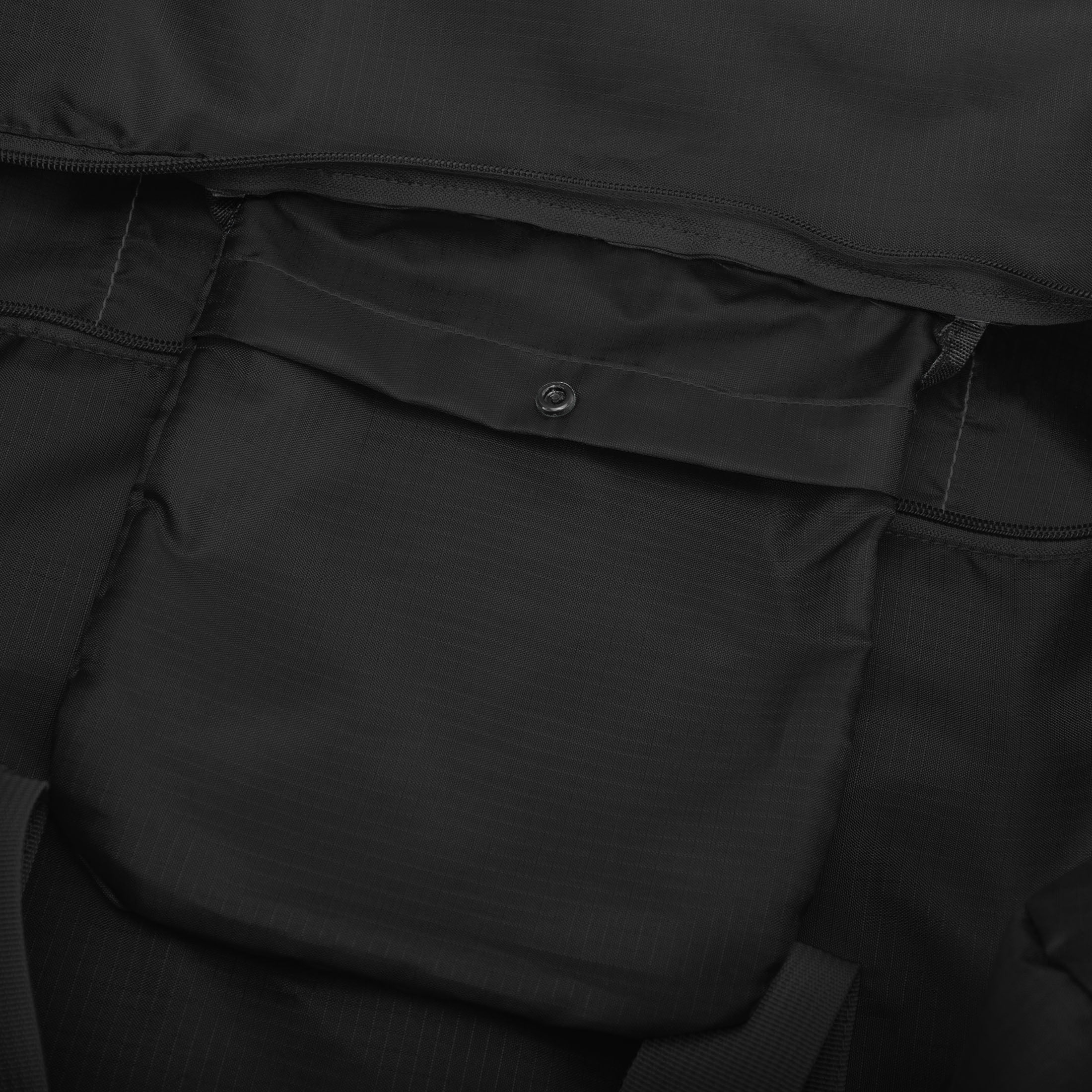 Not only does the iFLY packable duffle come with an adjustable shoulder strap, but it also includes a luggage trolley sleeve for easy attachment to a wheeled suitcase. This feature allows for effortless navigation through travel hubs, ensuring seamless transport of your belongings. When not in use, this duffle bag can be conveniently folded for compact storage, making it ideal for those with limited space or those in need of an extra bag during their travels.