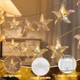 thumbnail image 3 of YUNOVA 9.84FT Battery Powered Shell String Lights - 20 LED Starfish & Seashell Fairy Lights, Ocean Theme Decor for Bedroom, Wedding, Garden Party, Beach Holiday Decorations, 3 of 8