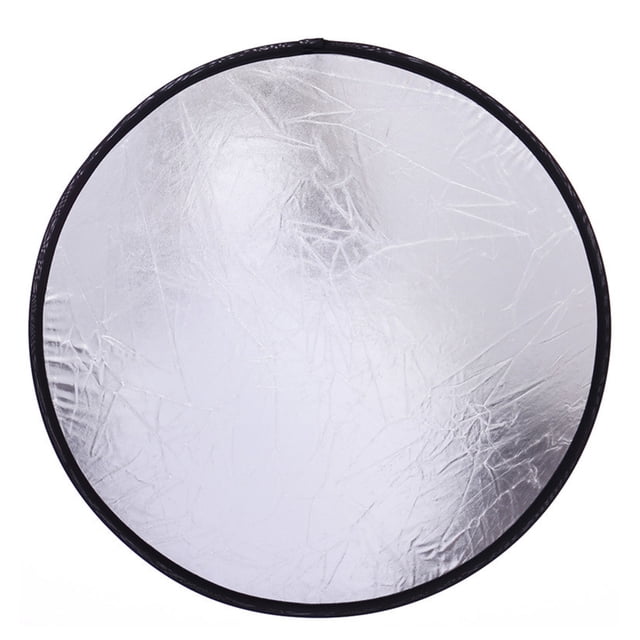 reflector de luz para fotografía plegable accesorios de fotografía reflector de fotos, vista frontal centrada de un reflector redondo plateado de 30x30 cm con borde negro y superficie texturizada de nailon reflectante, diseño plegable y liviano ideal para fotografía de joyas, cosméticos y bodegones; portátil y fácil de guardar.