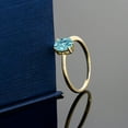 thumbnail image 3 of Gem Stone King 10K Yellow Gold Blue Zircon Solitaire Engagement Ring for Women (1.20 Cttw, Oval 7X5MM, Gemstone Birthstone, Size 6), 3 of 3