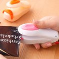 thumbnail image 2 of SNNROO Handheld Heat Vacuum Sealer and Cutter, Portable Chip Bag Resealer Machine for Snack Plastic Fresh Bags Cookies, 2 of 5