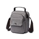 thumbnail image 1 of Bolso bandolera de lona tipo bandolera para hombre compacto, 1 of 1