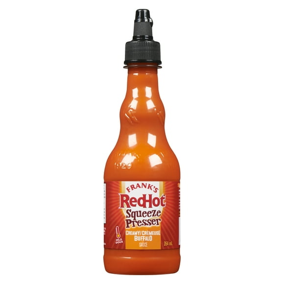 FRANK'S RedHot CREAMY BUFFALO SAUC, Bring the heat with Frank's RedHot® Creamy Buffalo Sauce Squeeze! Thick and saucy with a smooth drizzle, this convenient sauce delivers the mild heat of Frank’s RedHot cayenne sauce with a creamy texture.