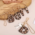 thumbnail image 4 of Llavero de letra inicial Uxcell (letra T) - Llavero de alfabeto de leopardo de cuero PU para hombres, mujeres, decoración de bolso, mochila, regalo de fiesta, dorado, 4 of 7