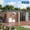 Brown + black, variant on 12x10 FT Large Outdoor Storage Shed with Pegboard & Solar Motion Sensor Light, Heavy-Duty Tool Metal Shed with Sloping Roof & Lockable Double Doors for Backyard, Patio, Lawn