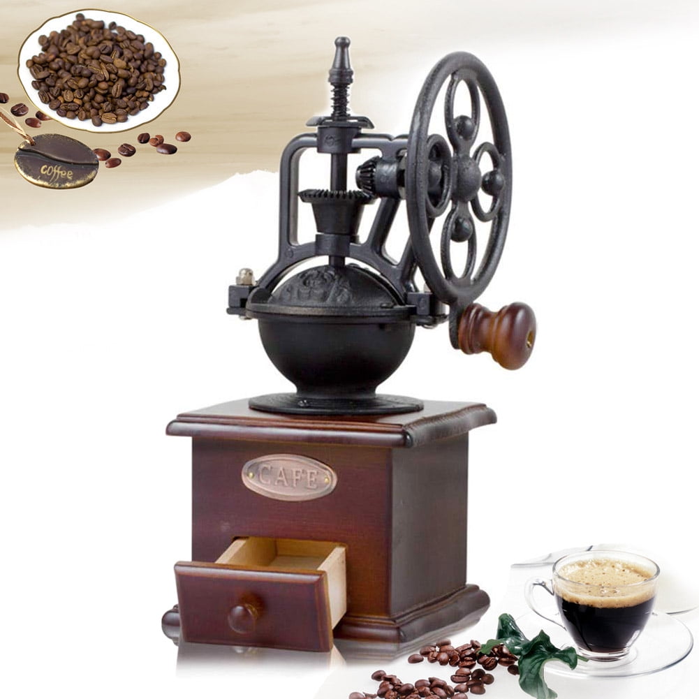 Vintage coffee grinder.Old retro hand-operated wooden and metal