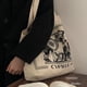 thumbnail image 4 of Bolso de lona de moda con estampado literario, bolso de compras de gran capacidad para mujer, bolso de tela de algodón, bolso de mano sencillo y versátil para ocio, 4 of 5