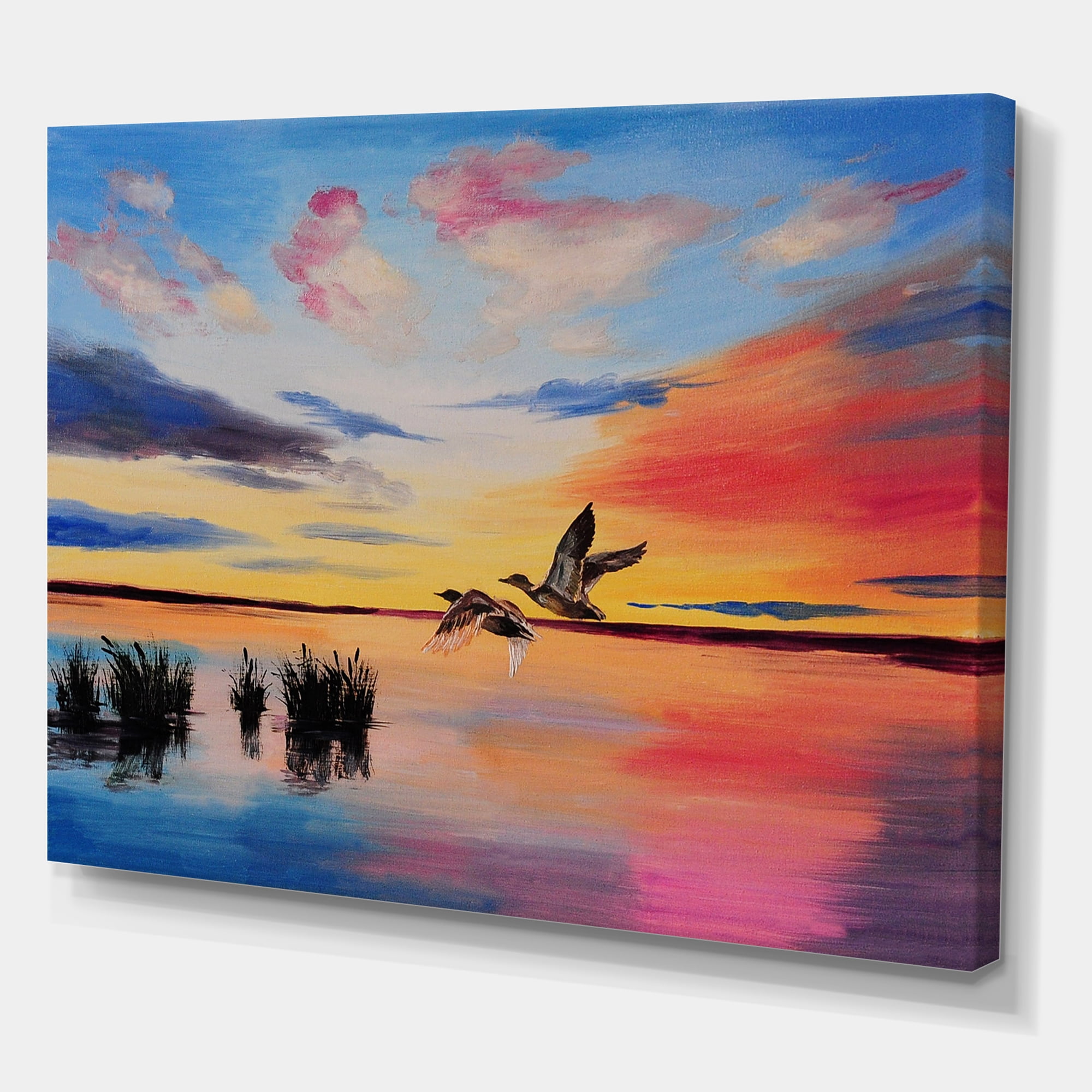 Designart ' Crane Birds Flying During Colorful Sunset ' Nautical & Coastal Canvas Wall Art Print