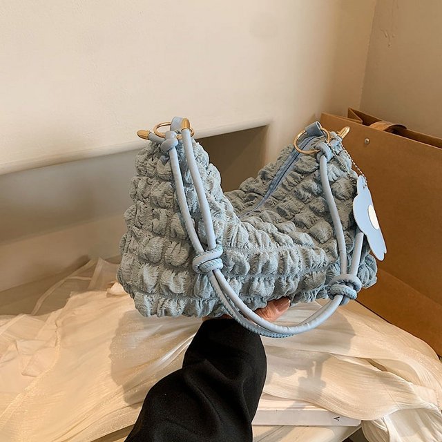 Bolso casual coreano de moda de gran capacidad plisado, nuevo estilo de primavera 2025, bolso bandolera estilo occidental, bolso tipo dumpling, bolso de mujer