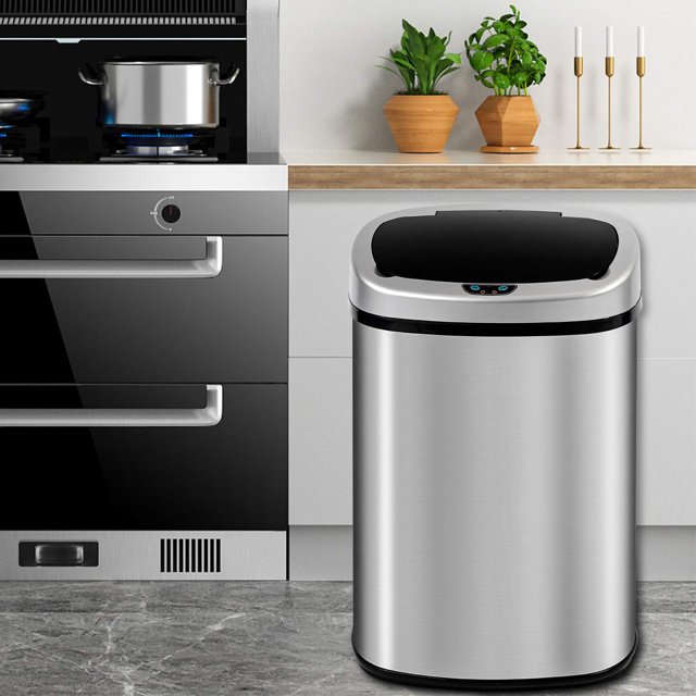Stainless steel motion sensor trash can in a modern kitchen