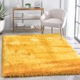 thumbnail image 1 of Well Woven Chie Mustard Yellow Kuki Collection Ultra Soft Two-Tone Floppy Pile Shag Area Rug 9'3" x 12'6", 1 of 8