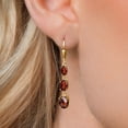 thumbnail image 3 of Gem Stone King 18K Yellow Gold Plated Silver Red Garnet 3 Stone Dangle Earrings for Women (6.21 Cttw, Gemstone January Birthstone, Oval Checkerboard 8X6MM, 7X5MM and 6X4MM), 3 of 6