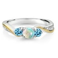thumbnail image 2 of Gem Stone King 925 Silver and 10K Yellow Gold White Simulated Opal Swiss Blue Topaz and White Lab Grown Diamond 3 Stone Engagement Ring for Women (0.58 Cttw, October Birthstone, Size 9), 2 of 3