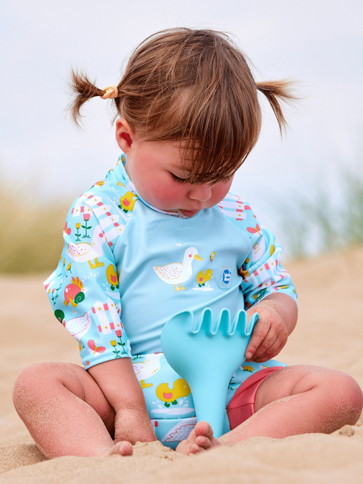 Splash About Baby Girl's Happy Nappy Sunsuit, One-Piece Swimsuit with Swim Diaper - Little Ducks, 12-24 Months