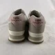 thumbnail image 5 of New Balance 574 Road Running Shoes Men 11 D Women’s 12.5 D Width Pink And Cream, 5 of 6