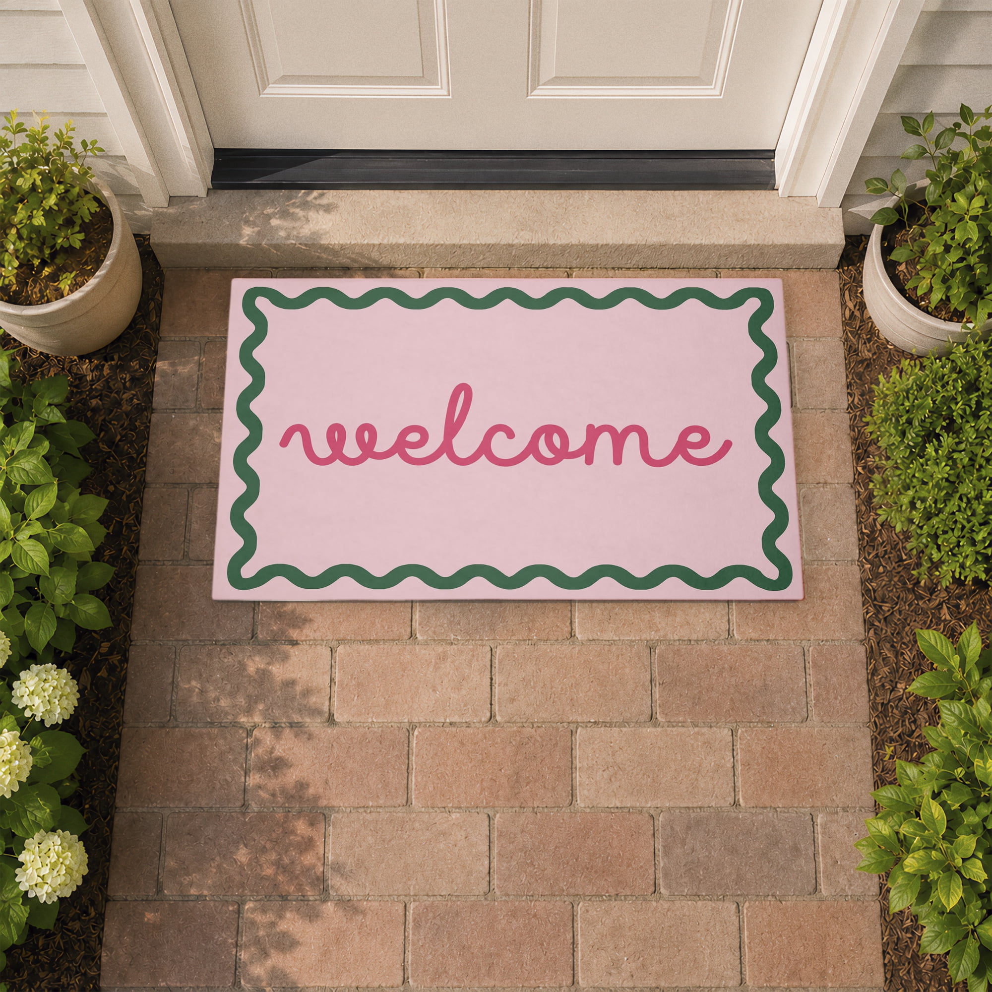 Stupell Industries Cursive Welcome over Pink Printed Outdoor Door Floor Mat, design by Lil' Rue