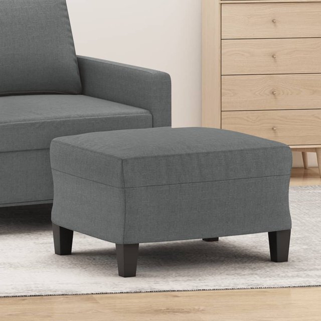 vidaXL Repose-Pieds en Tissu Gris Foncé, Mesurant 60x50x41 cm, Montré dans un Décor de Salon. le Repose-Pieds Présente un Tissu 100 % polyester durable, un Cadre en Contreplaqué Robuste et un Rembourrage en Mousse pour le Confort. Il Se Positionne sur un Tapis Léger Près d'Un sofa Gris Foncé Assorti et d'Une Commode en Bois, Mettant en Valeur Son design compact et Polyvalent.