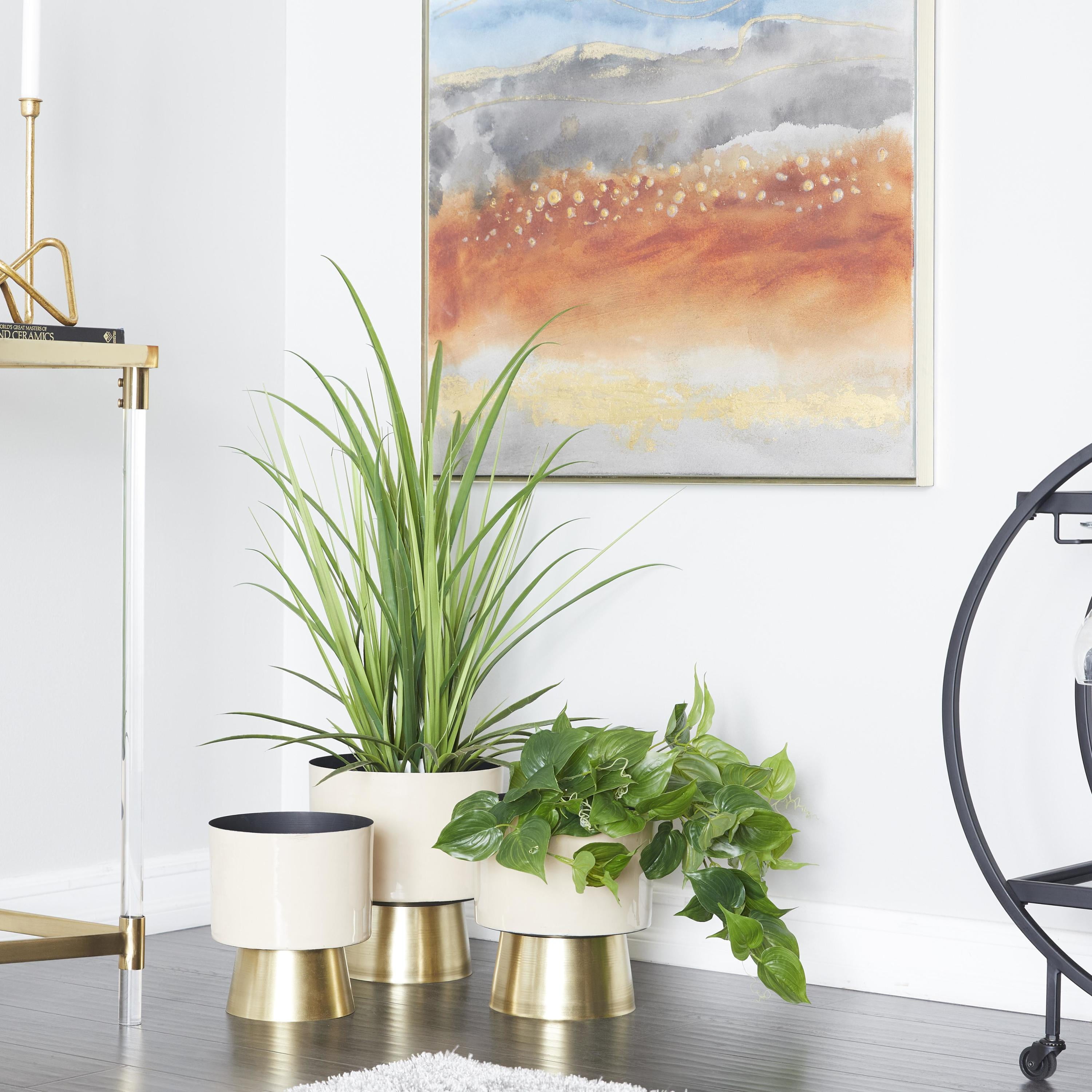 CosmoLiving by Cosmopolitan 11", 10", 9"H Cream Metal Planter with Gold Base (3 Count)