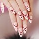 thumbnail image 1 of Uñas falsas brillantes ovaladas prensa en uñas blancas de color rojo medio Afortunado Sencillez, 1 of 5
