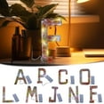 thumbnail image 1 of Luz nocturna con letras de resina floral y flores secas • Lámpara del alfabeto iluminada por LED • Decoración inicial personalizada • Acento de habitación alimentado por pilas, 1 of 3