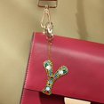 thumbnail image 1 of Cuadros Decorativos LLavero de resina para mujer llavero con letras pintadas con diamantes, 1 of 8