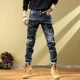 thumbnail image 5 of Pantalones vaqueros rotos con agujeros para hombre, pantalones cargo con gráficos, pantalones vaqueros para hombre, ropa de otoño rota, estilo retro, algodón apilado, informal, 5 of 5