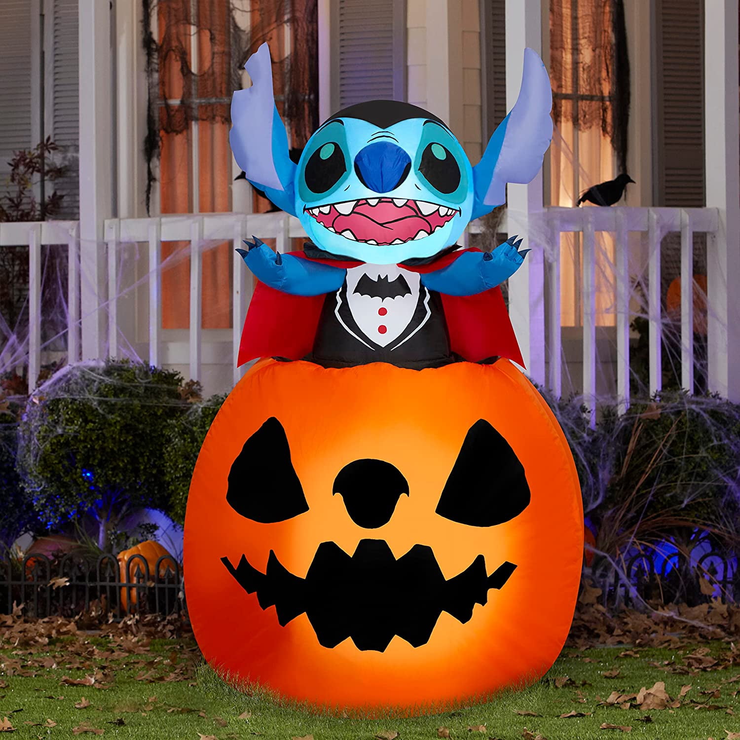 Gemmy Animated Airblown Inflatable Vampire Stitch Popping Out of Pumpkin Disney, 5 ft Tall, Multicolored