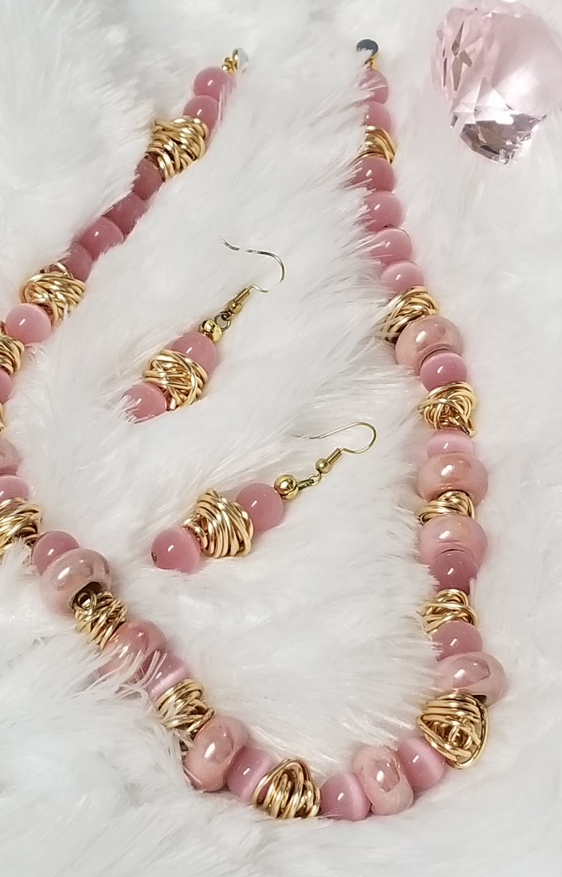 Pink Cats Eye Glass twist pendant