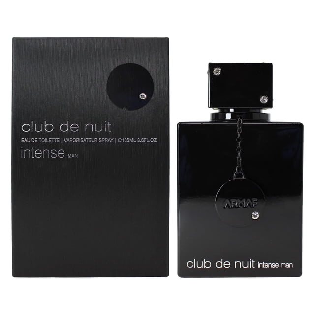 armaf club de nuit intenso hombre edt hombres nuevo inbox perfume de hombre negro 105ml Frasco cuadrado negro brillante con tapa rectangular y placa circular colgante con logo, junto a caja negra texturizada con texto 'club de nuit intense'. Fragancia masculina con notas frescas y amaderadas, adecuada para uso diario o viajes; suele guardarse en neceser de viaje.