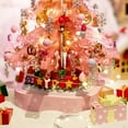 thumbnail image 6 of Phenas Pink Christmas Tree Building Blocks Toy Kit -675 Pieces, Collectible Xmas Music Box Gifts for Kids, 6 of 13