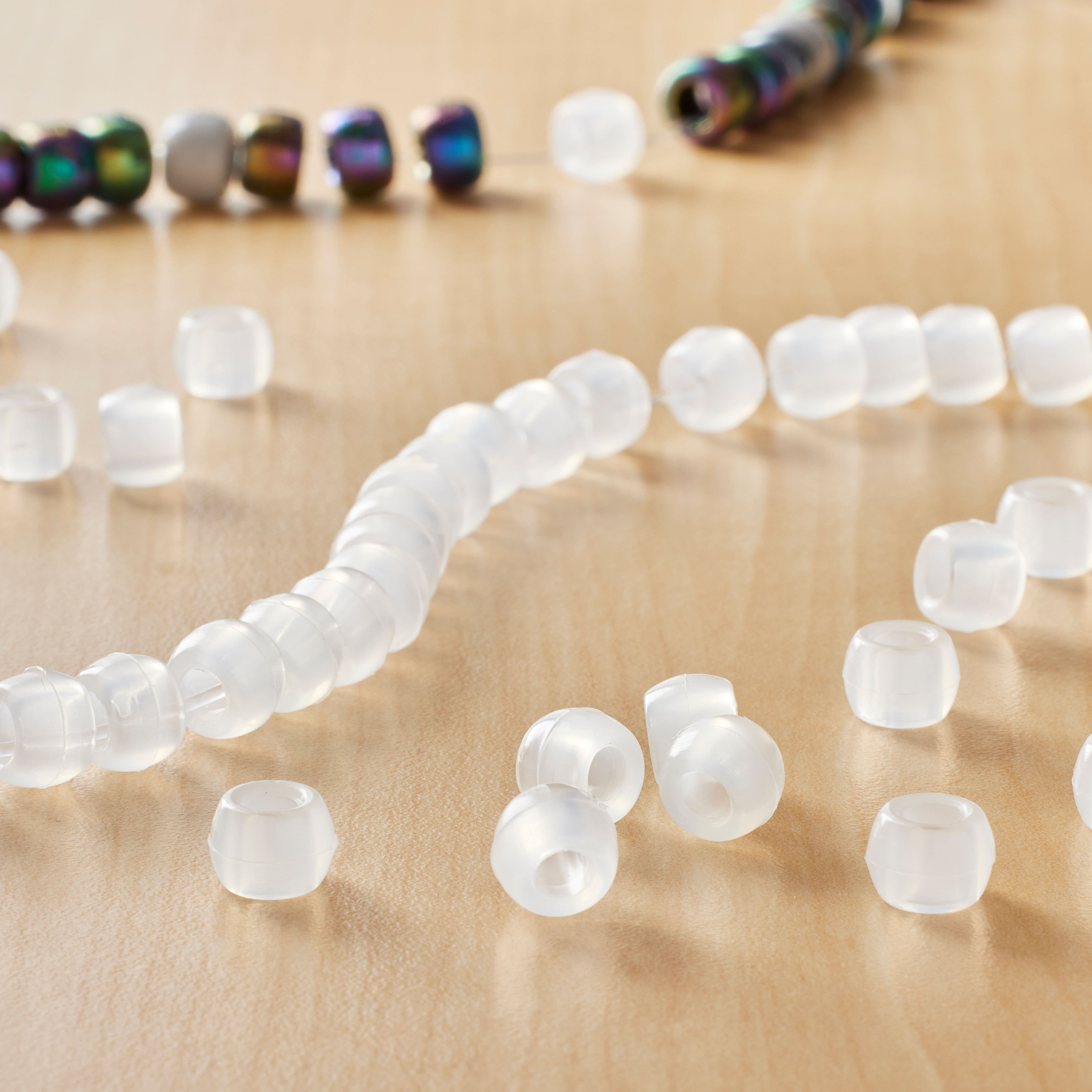 12 Packs: 280 ct. (3,360 total) Color Change Clear Pony Beads by Creatology - 6mm x 8mm