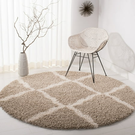 Safavieh Daley Geometric Plush Shag Area Rug or Runner SAFAVIEH Dallas Shag SGDS257D Beige / Ivory Rug Inspired by classic shag rugs in European homes  SAFAVIEH s Dallas Shag Collection is a stylish transitional floor covering that blends chic modern design with expert construction. Boasting a 2-inch pile height  this rug provides sink-in comfort underfoot while imbuing a sense of sumptuous relaxation. Rug has an approximate thickness of 1.5 inches. For over 100 years  SAFAVIEH has set the standard for finely crafted rugs and home furnishings. From coveted fresh and trendy designs to timeless heirloom-quality pieces  expressing your unique personal style has never been easier. Begin your rug  furniture  lighting  outdoor  and home decor search and discover over 100 000 SAFAVIEH products today.