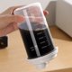 thumbnail image 5 of Taza de café Cold Brew transparente con escala | Tapa a prueba de fugas | Taza de té helado de plástico apta para microondas | Botella de agua reutilizable de viaje portátil | 401-500ml | Blanco, 5 of 7