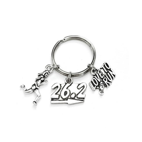 26.2 Marathon themed keychain. Includes Runner Figurine, 26.2 sign, and I Love to Run Charms. Marathon Runner gift.