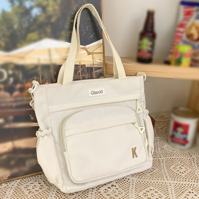 Mochila ligera de nailon para estudiantes, bolso de mano duradero con cremallera, Color sólido, ajustable, para ocio diario Fivean unisex