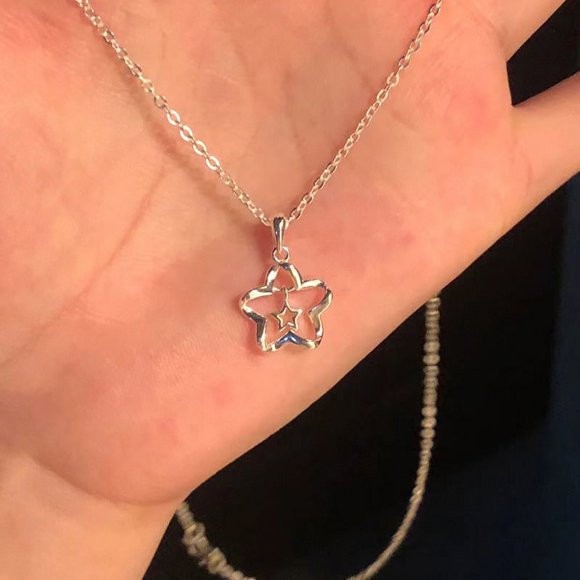 Tatum88 Hollow Out Star Pendant Necklace