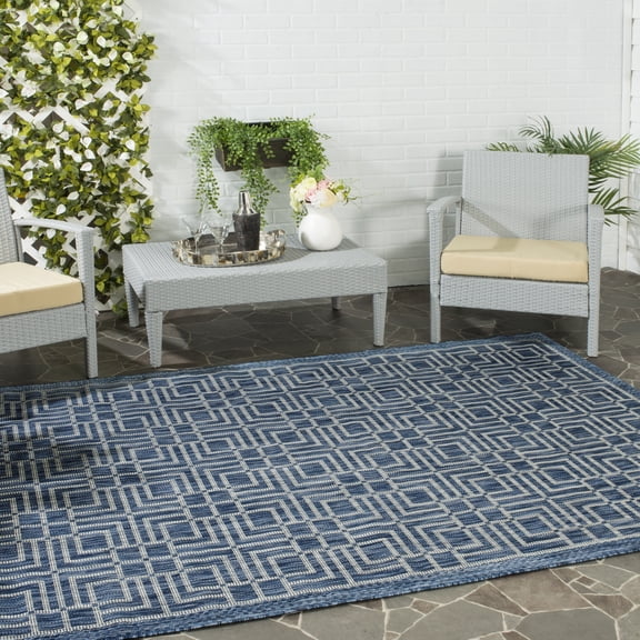 SAFAVIEH Courtyard Neville Geometric Tiles Indoor/Outdoor Area Rug, 5'3" x 7'7", Navy/Grey