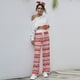 thumbnail image 1 of Pantalones casuales con cordones para mujer de Europa y América, pantalones holgados con cordones y estampado navideño a la moda, 1 of 6