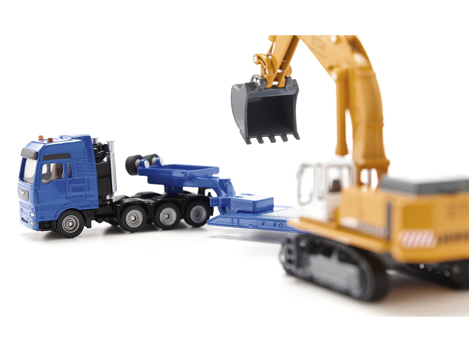 Heavy Haulage Flatbed Transporter Blue and Liebherr 974